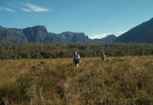 Hiking back from Lake Judd with the cliffs of the Eliza Plateau in the background